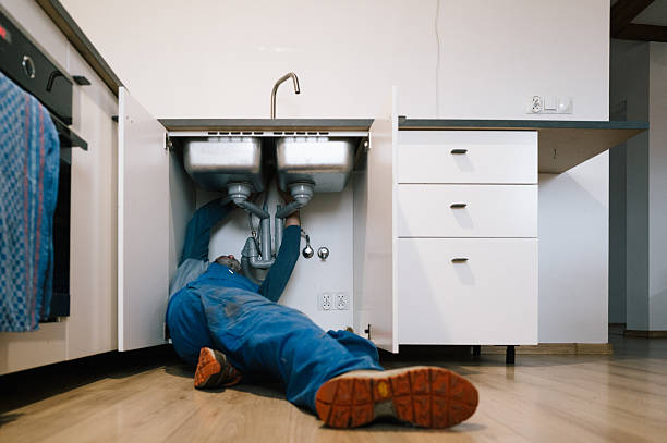 Professional Emergency Plumber technician working in Afton, MN